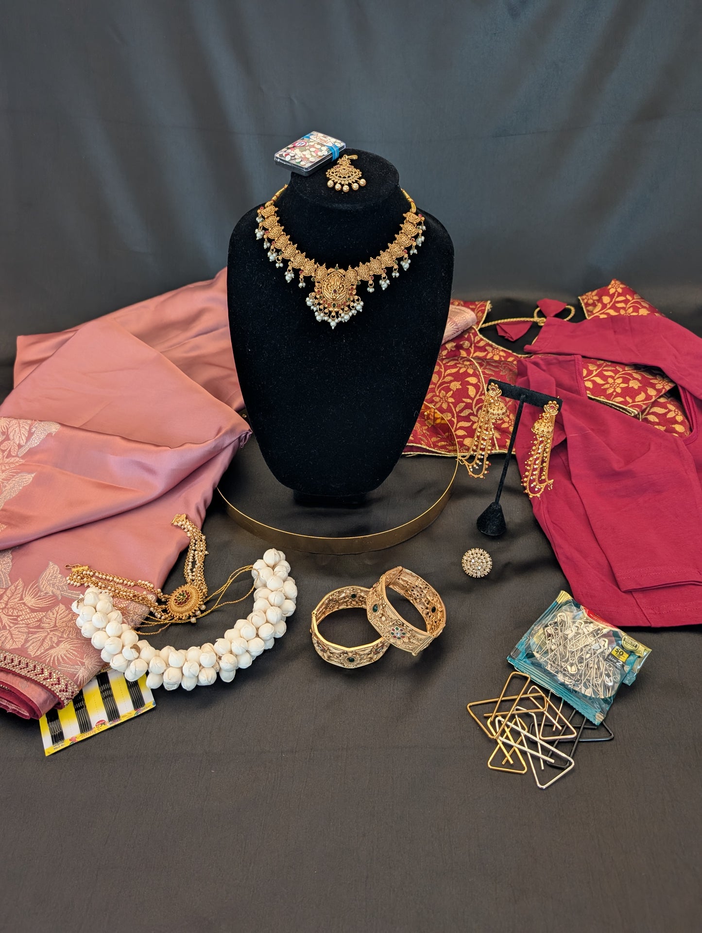 Pink Designer Saree with Red Border & Gold Bird Designs
