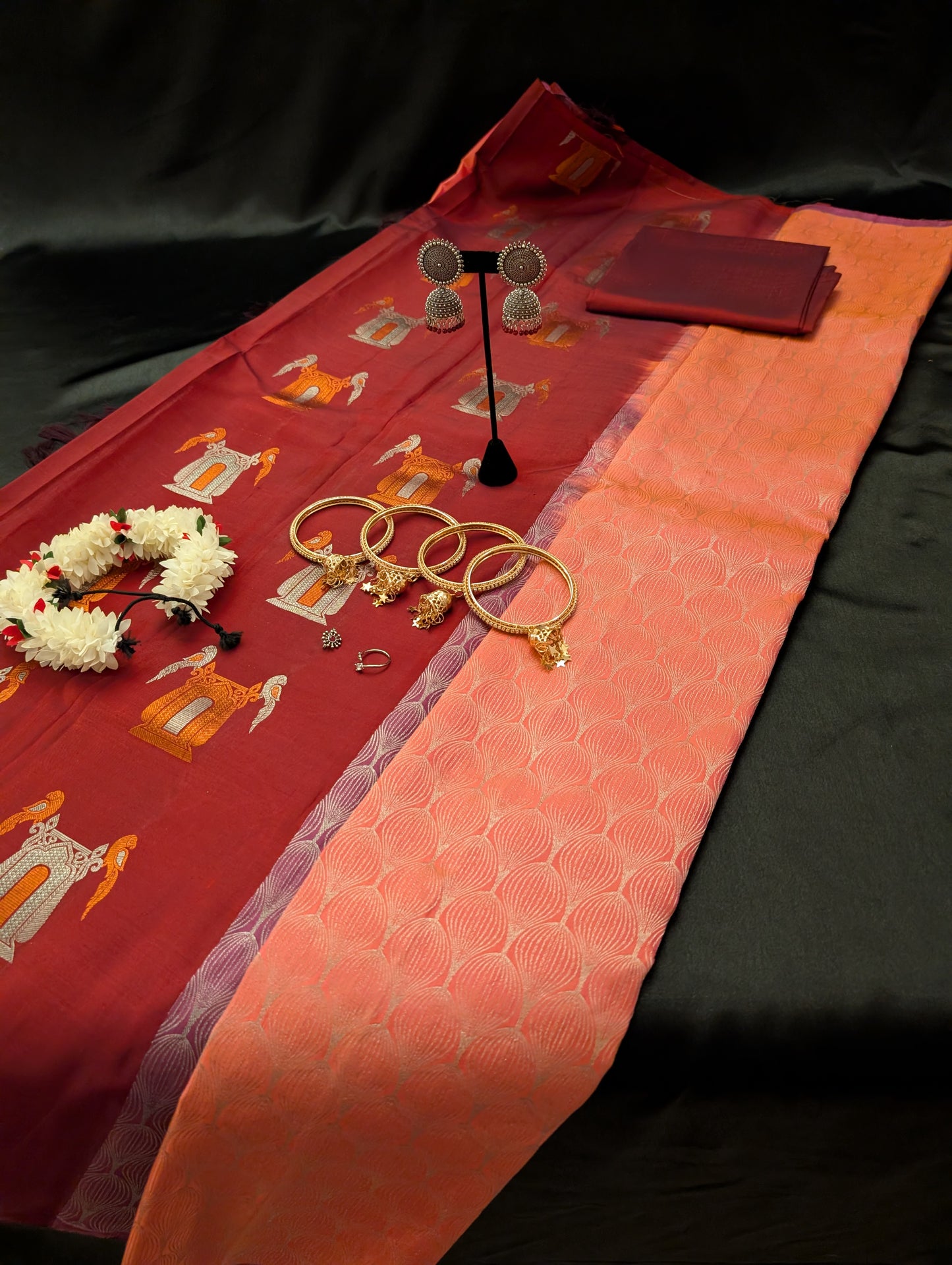 Pink Designer Saree with Red Accents & Silver Round Designs