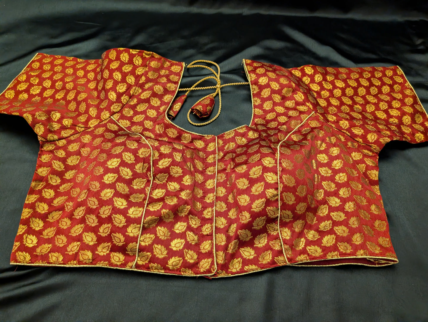 Beautiful Kerala Off-White Designer Saree paired with a green designer blouse material with tassels — full set