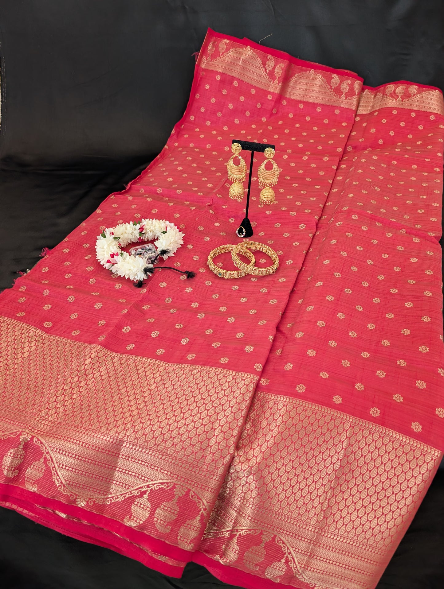 Stunning pink saree with elegant gold designs and a rich, thick gold border — full set