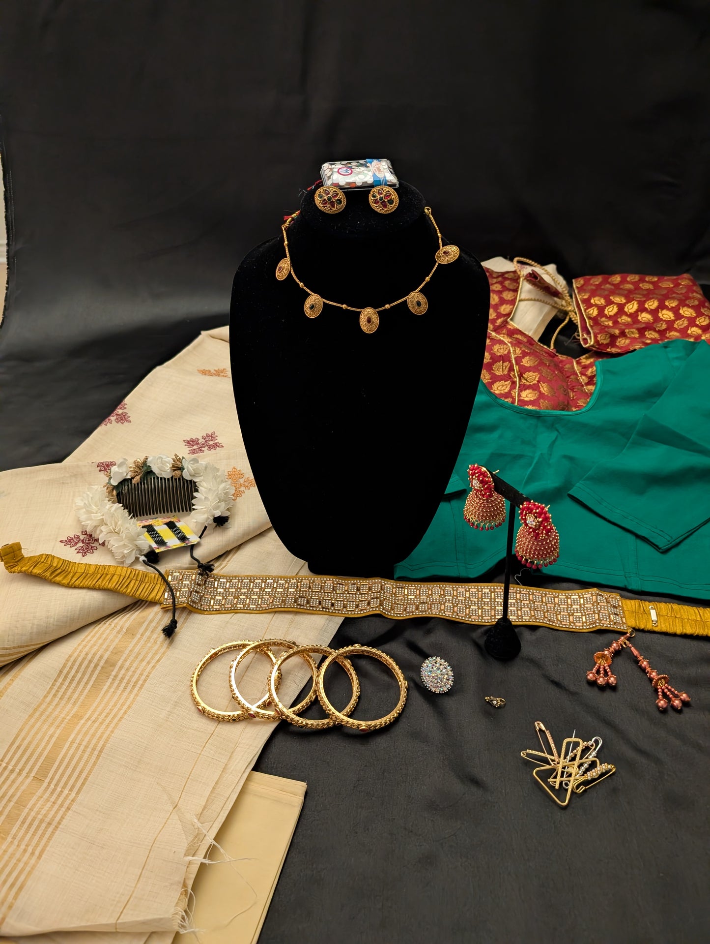 Beautiful Kerala Off-White Designer Saree paired with a green designer blouse material with tassels — full set