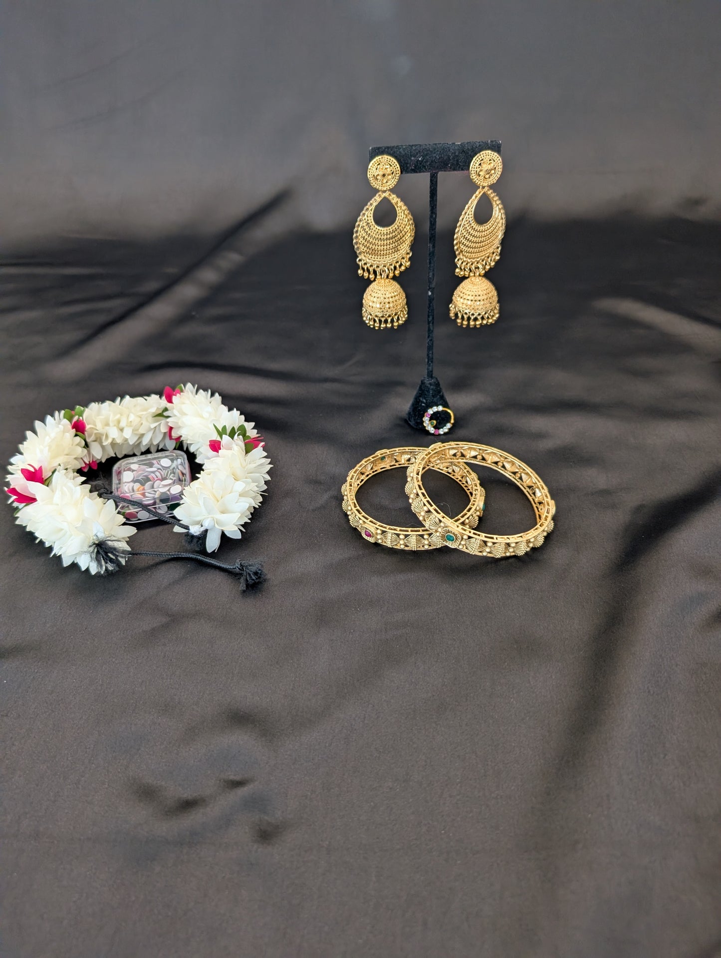 Stunning pink saree with elegant gold designs and a rich, thick gold border — full set